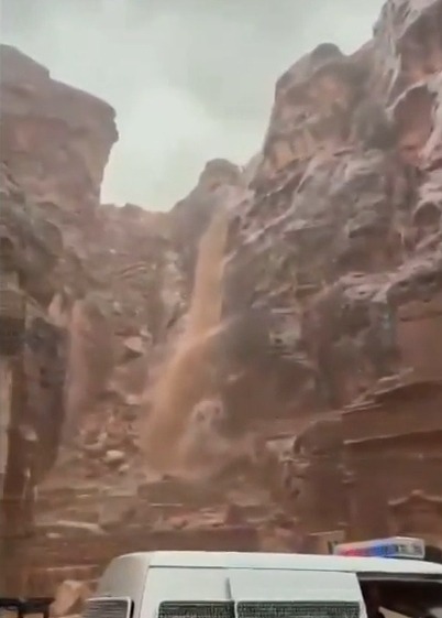 Flash flood in Petra, Jordan, forcing tourist evacuation.
