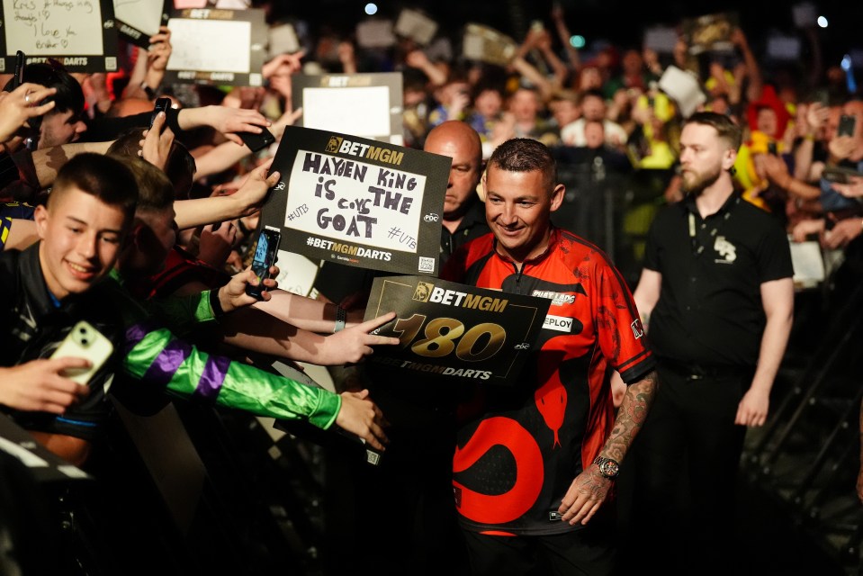 Nathan Aspinall walks out to play Michael van Gerwen (not pictured) on night fifteen of the BetMGM Premier League at P&J Live, Aberdeen. Picture date: Thursday May 15, 2025. PA Photo. See PA story DARTS Aberdeen. Photo credit should read: Andrew Milligan/PA Wire. RESTRICTIONS: Use subject to restrictions. Editorial use only, no commercial use without prior consent from rights holder.