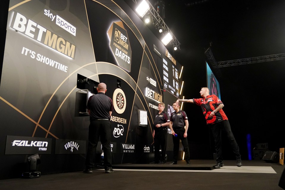 Nathan Aspinall in action during his match against Stephen Bunting (not pictured) on night fifteen of the BetMGM Premier League at P&J Live, Aberdeen. Picture date: Thursday May 15, 2025. PA Photo. See PA story DARTS Aberdeen. Photo credit should read: Andrew Milligan/PA Wire. RESTRICTIONS: Use subject to restrictions. Editorial use only, no commercial use without prior consent from rights holder.
