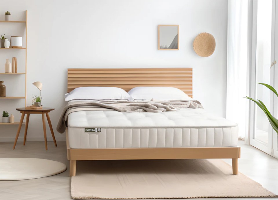 Simba mattress on a light wood bed frame.