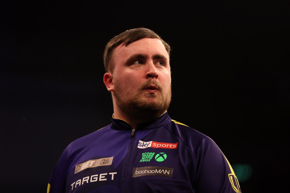SHEFFIELD, ENGLAND - MAY 22: Luke Littler of England looks on against Stephen Bunting of England during the 2025 BetMGM Premier League Darts at Utilita Arena Sheffield on May 22, 2025 in Sheffield, England. (Photo by George Wood/Getty Images)