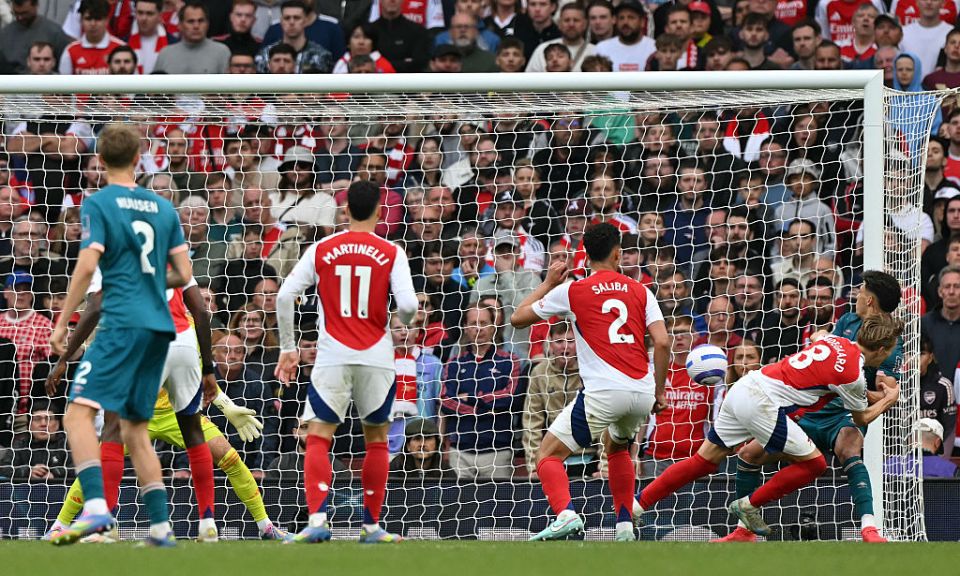 Bournemouth's Brazilian striker #09 Evanilson (R) scores the team's second goal during the English Premier League football match between Arsenal and Bournemouth at the Emirates Stadium in London on May 3, 2025. (Photo by Glyn KIRK / AFP) / RESTRICTED TO EDITORIAL USE. No use with unauthorized audio, video, data, fixture lists, club/league logos or 'live' services. Online in-match use limited to 120 images. An additional 40 images may be used in extra time. No video emulation. Social media in-match use limited to 120 images. An additional 40 images may be used in extra time. No use in betting publications, games or single club/league/player publications. /  (Photo by GLYN KIRK/AFP via Getty Images)