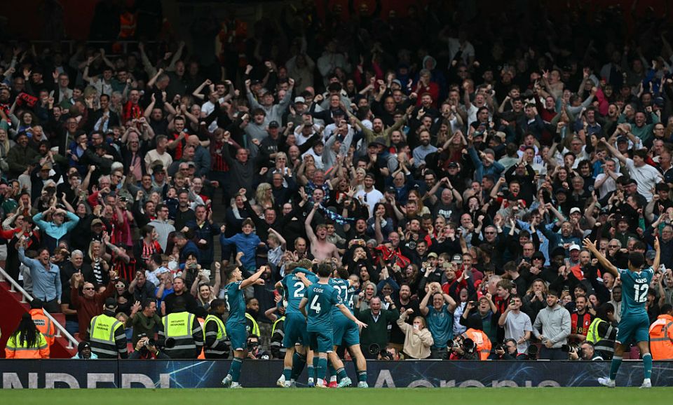 Bournemouth's Brazilian striker #09 Evanilson is mobbed by teammates after scoring the team's second goal during the English Premier League football match between Arsenal and Bournemouth at the Emirates Stadium in London on May 3, 2025. (Photo by Glyn KIRK / AFP) / RESTRICTED TO EDITORIAL USE. No use with unauthorized audio, video, data, fixture lists, club/league logos or 'live' services. Online in-match use limited to 120 images. An additional 40 images may be used in extra time. No video emulation. Social media in-match use limited to 120 images. An additional 40 images may be used in extra time. No use in betting publications, games or single club/league/player publications. /  (Photo by GLYN KIRK/AFP via Getty Images)