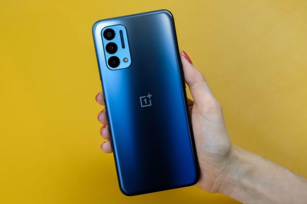 OnePlus Nord N200 5G smartphone in hand.