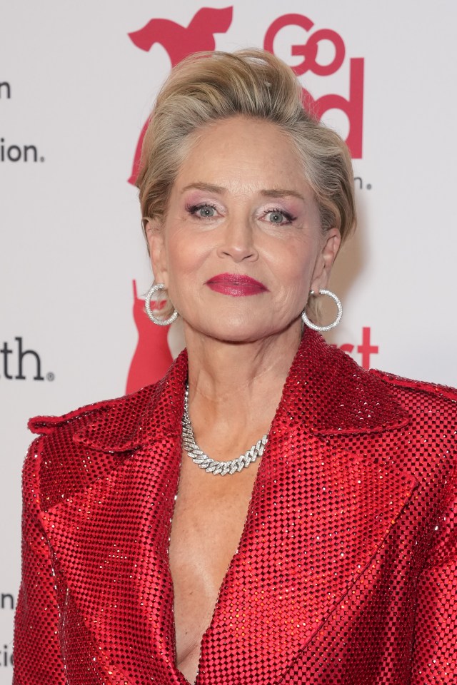 Sharon Stone at the American Heart Association's Red Dress Collection Concert in a red sequined jumpsuit.