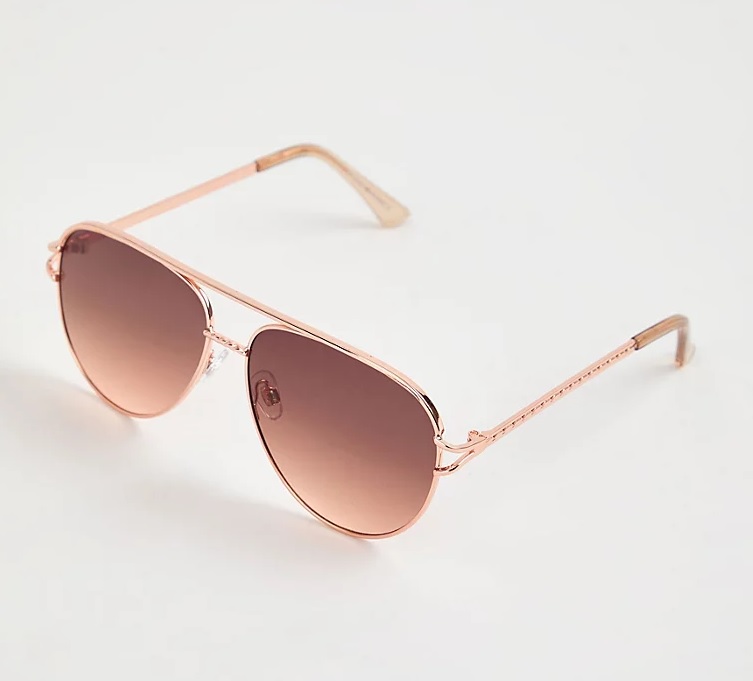 Rose gold aviator sunglasses with brown gradient lenses.