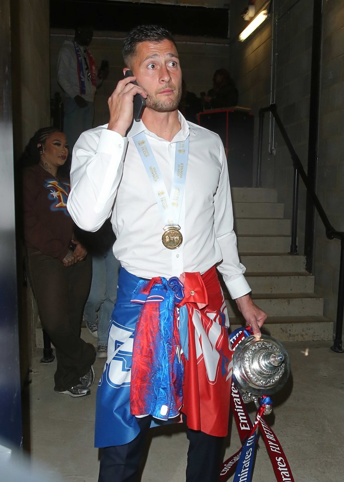 Crystal Palace player Joel Ward celebrating with the FA Cup.