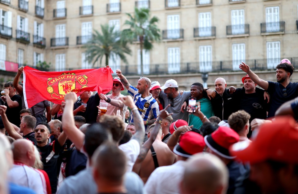 Manchester United fans celebrating in Bilbao.