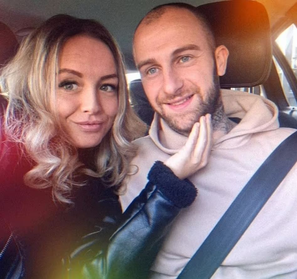 Couple in a car.