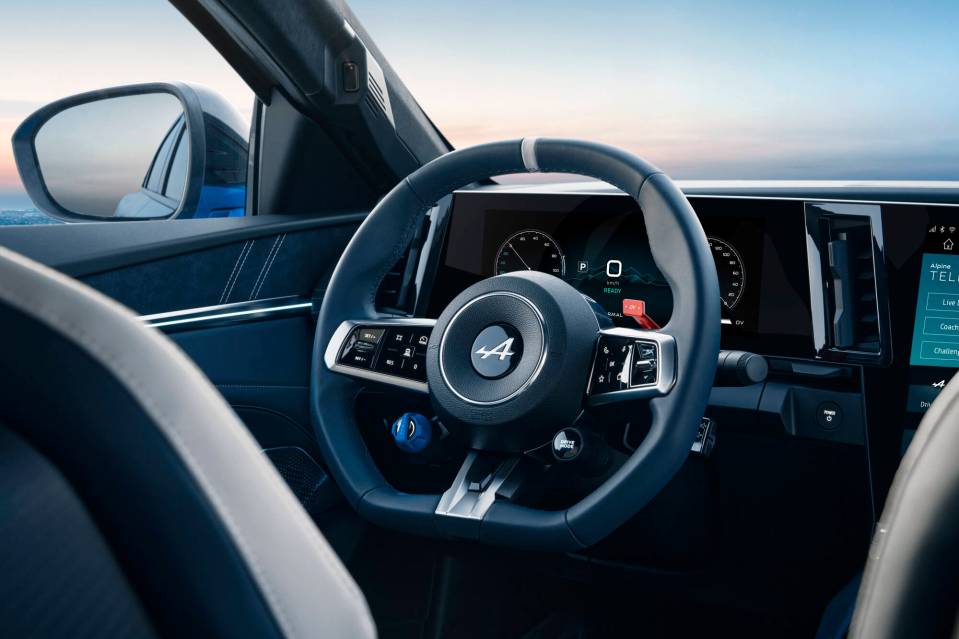 Alpine A390 interior: steering wheel and dashboard.