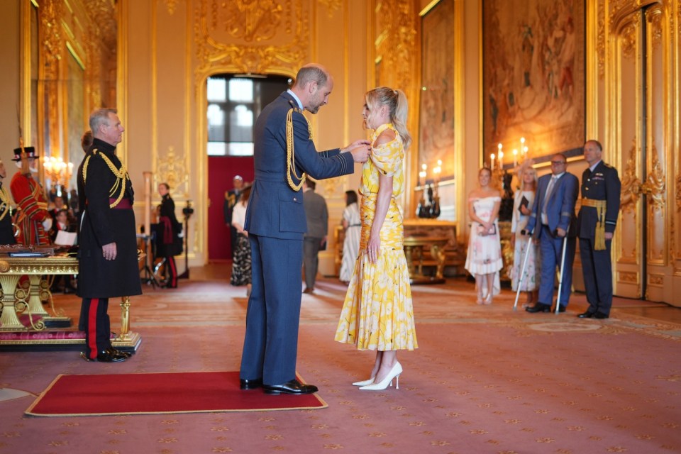 Keely Hodgkinson, from Salford, is made a Member of the Order of the British Empire by the Prince of Wales at Windsor Castle. The honour recognises services to athletics.Picture date: Tuesday May 13, 2025. PA Photo. See PA story ROYAL Investiture. Photo credit should read: Yui Mok/PA Wire