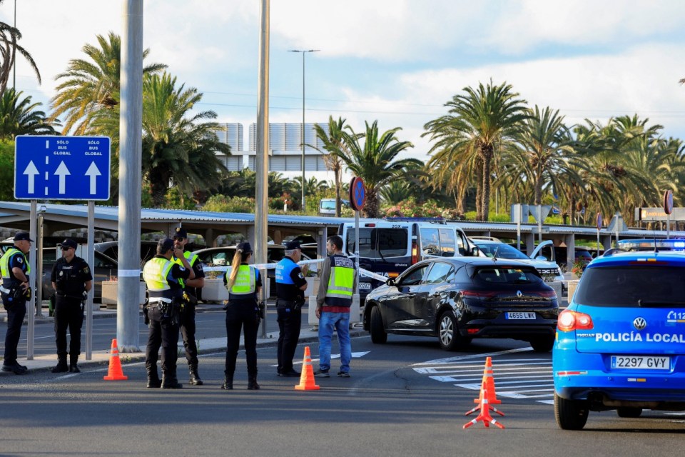 Spanish National Police officers at Gran Canaria Airport following a police shooting.