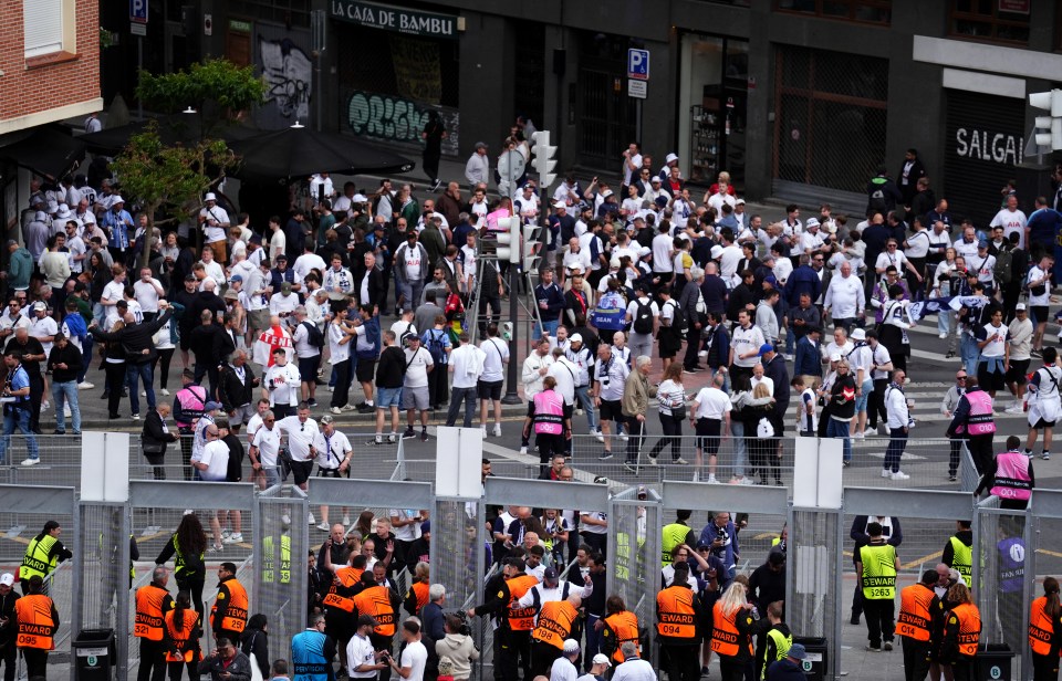 Tottenham Hotspur fans make their way through security gates ahead of the UEFA Europa League final at the Estadio de San Mames, Bilbao, Spain. Picture date: Wednesday May 21, 2025. PA Photo. See PA story SOCCER Final. Photo credit should read: Andrew Milligan/PA Wire. RESTRICTIONS: Use subject to restrictions. Editorial use only, no commercial use without prior consent from rights holder.
