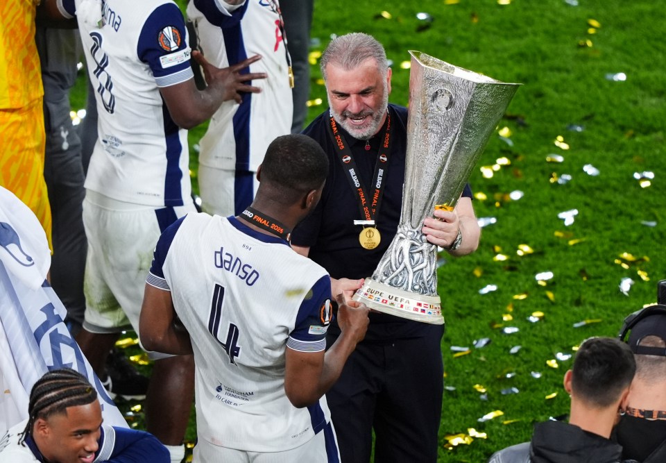 Tottenham Hotspur manager Ange Postecoglou and Kevin Danso with the Europa League trophy following his sides victory over Manchester United at the Estadio de San Mames, Bilbao, Spain. Picture date: Wednesday May 21, 2025. PA Photo. See PA story SOCCER Final. Photo credit should read: Andrew Milligan/PA Wire. RESTRICTIONS: Use subject to restrictions. Editorial use only, no commercial use without prior consent from rights holder.