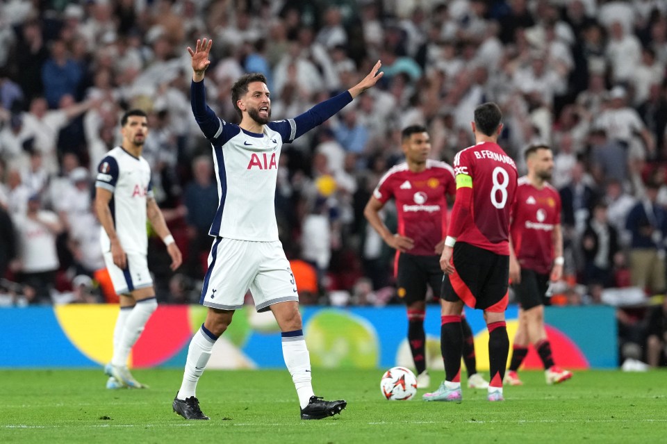 Tottenham Hotspur's Uruguayan midfielder #30 Rodrigo Bentancur celebrates the opening goal scored by Tottenham Hotspur's Welsh forward #22 Brennan Johnson during the UEFA Europa League final football match between Tottenham Hotspur and Manchester United at San Mames stadium in Bilbao on May 21, 2025. (Photo by CESAR MANSO / AFP) (Photo by CESAR MANSO/AFP via Getty Images)