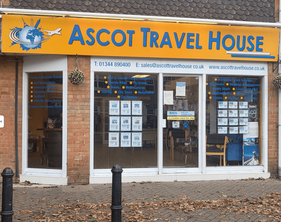 Ascot Travel House storefront with services listed.