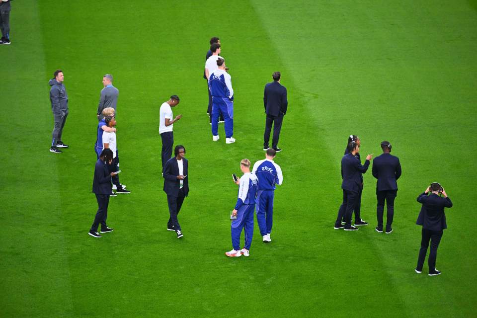 Tottenham players walk on the pitch ahead of the Europa League final soccer match between Tottenham Hotspur and Manchester United at the San MamÃ©s Stadium in Bilbao, Spain, Wednesday, May 21, 2025. (AP Photo/Miguel Oses)