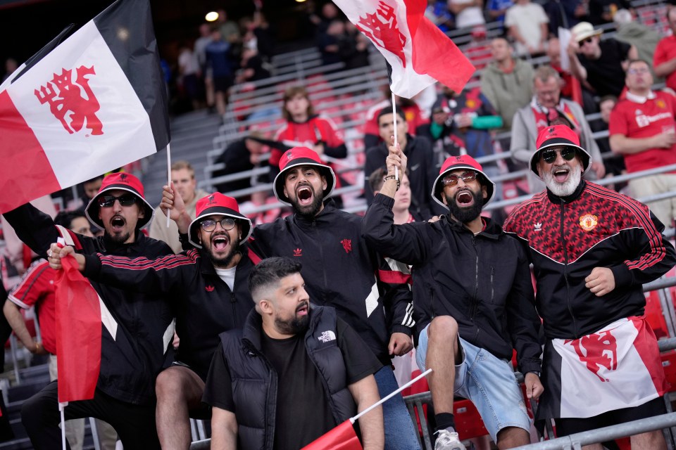 Manchester United fans cheer before the Europa League final soccer match between Tottenham Hotspur and Manchester United at the San MamÃˆs Stadium in Bilbao, Spain, Wednesday, May 21, 2025. (AP Photo/Bernat Armangue)