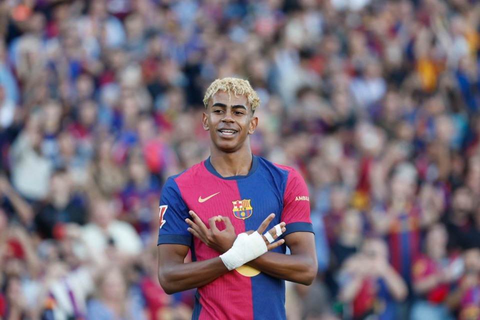 Barcelona's Lamine Yamal celebrates after scoring his side's opening goal during the Spanish La Liga soccer match between Barcelona and Villarreal at Lluis Companys Olympic Stadium in Barcelona, Spain, Sunday, May 18, 2025. (AP Photo/Joan Monfort)