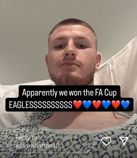 Man in hospital gown celebrating FA Cup victory.