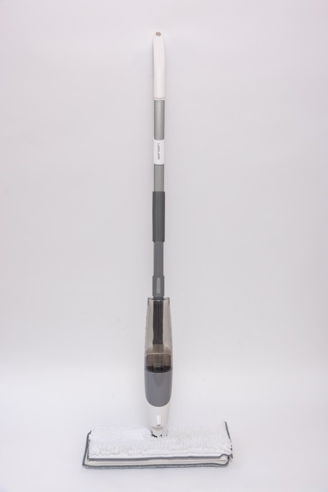 Spray mop with attached cleaning pad.