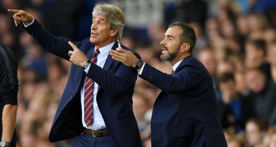 Manuel Pellegrini and Enzo Maresca, West Ham United manager and assistant coach, instructing their team.