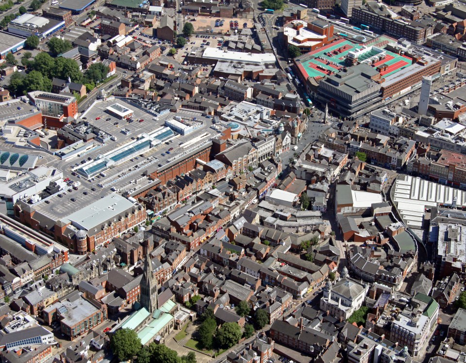 Aerial view of Leicester city center, showing Highcross Shopping Centre and Leicester Market.