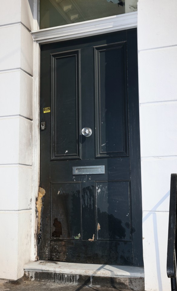 Fire-damaged front door.