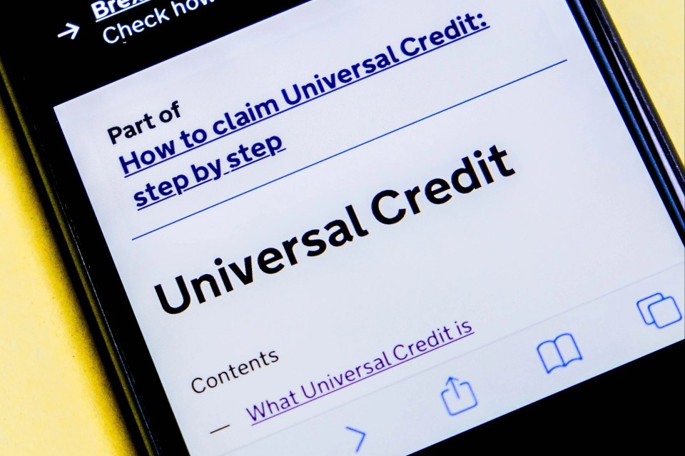 Smartphone displaying a UK government website page about Universal Credit.