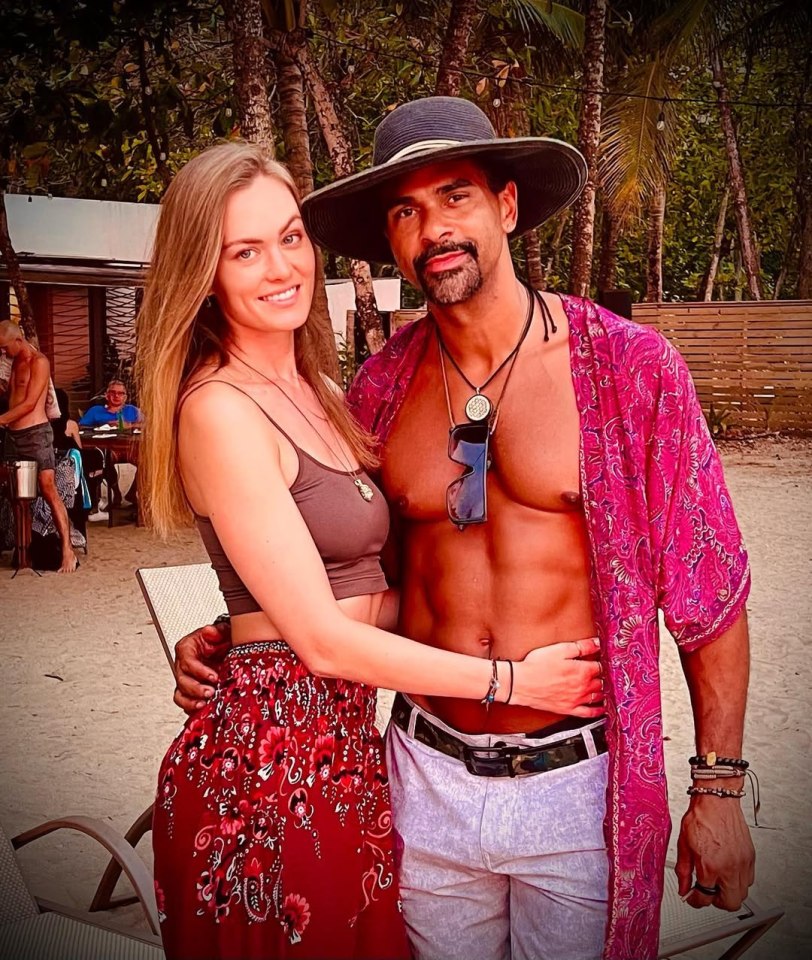 David Haye and Sian Osborne on a beach.