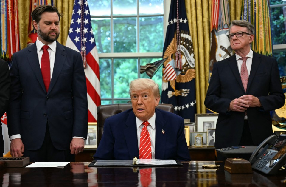 President Trump making a trade announcement with aides in the Oval Office.