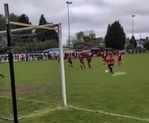 Luke Littler taking a penalty kick for Winton Yanited.