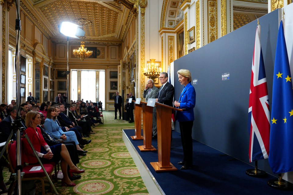 European Council President Antonio Costa and Prime Minister Sir Keir Starmer look on as President of the European Commission Ursula von der Leyen speaks during a press conference at the UK-EU summit at Lancaster House