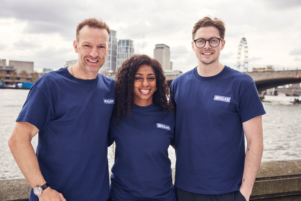 Three people wearing Bioglan t-shirts stand together outdoors in London.