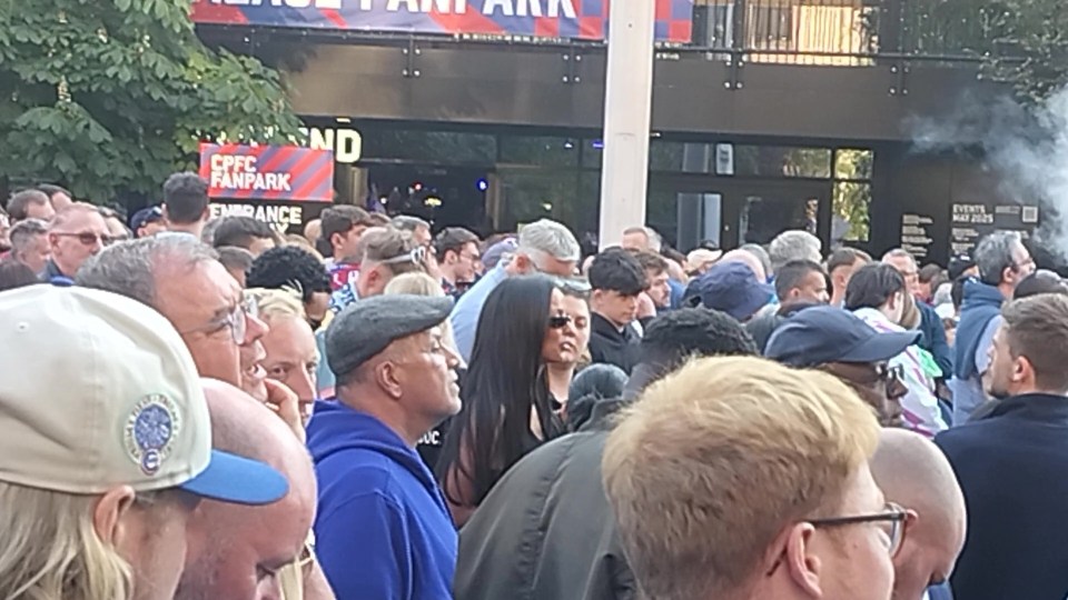 Maya Jama in a crowd of people leaving Wembley Stadium.