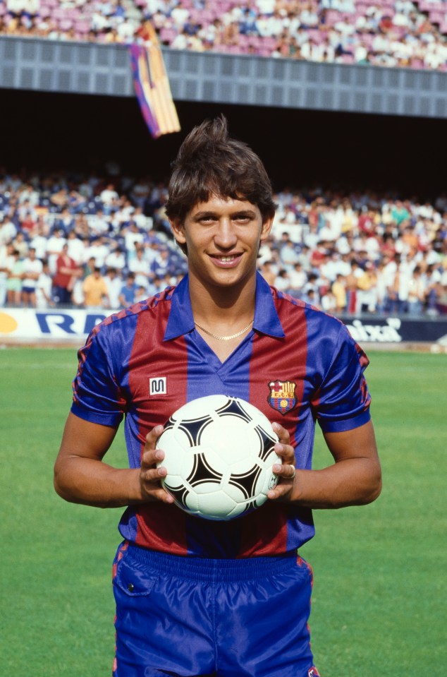 Gary Lineker in an FC Barcelona uniform holding a soccer ball.