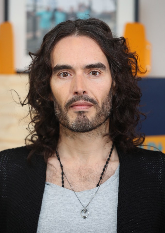 Headshot of Russell Brand.