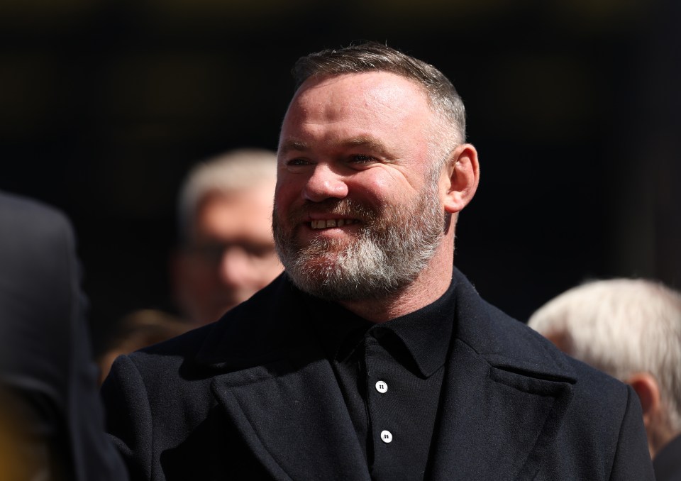 Wayne Rooney smiling.
