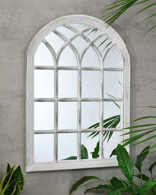 White arched windowpane mirror.