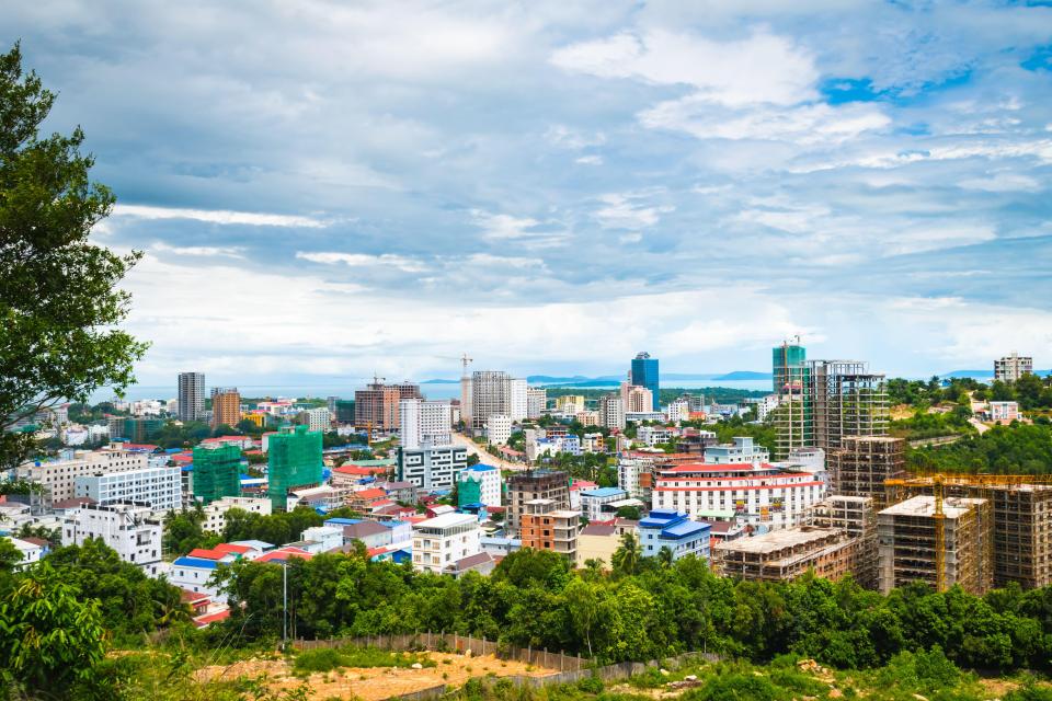 High-angle view of Sihanoukville, Cambodia, showing high-rise buildings and construction.