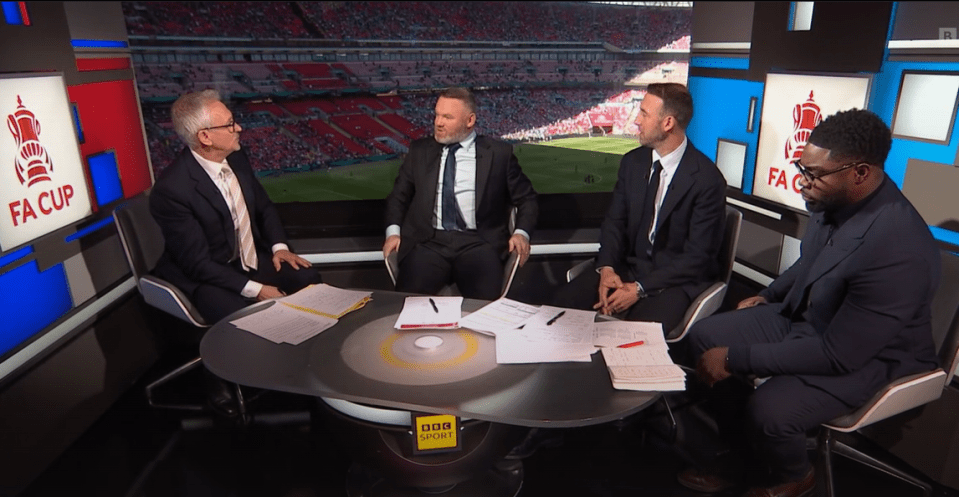 Four men sitting around a table discussing the FA Cup.