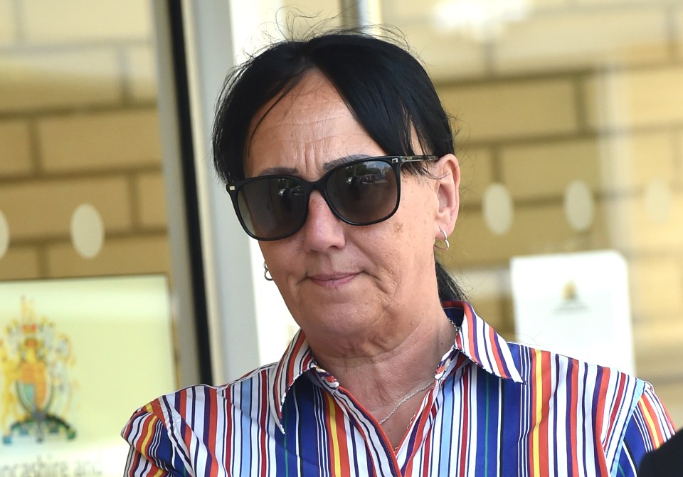 A woman wearing sunglasses outside a coroner's court.