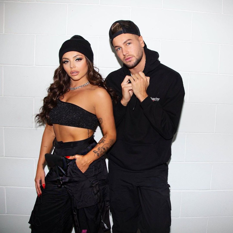 Jesy Nelson and Chris Hughes posing together.