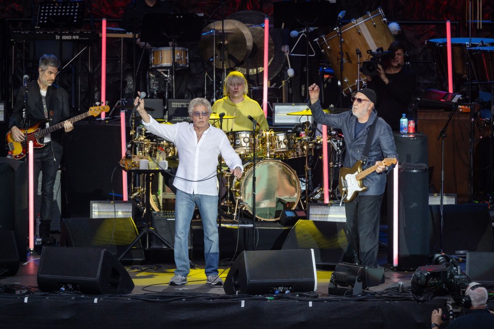 The Who performing live on stage.