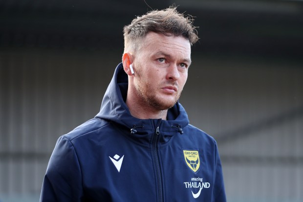 Josh McEachran of Oxford United arriving at a stadium.