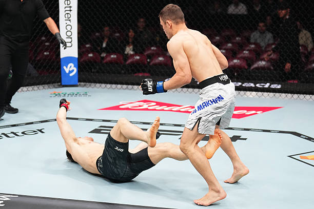 MONTREAL, QUEBEC - MAY 10: (R-L) Bekzat Almakhan of Kazakstan knocks out Brad Katona of Canada in a bantamweight bout during the UFC 315 event at Bell Centre on May 10, 2025 in Montreal, Quebec. (Photo by Chris Unger/Zuffa LLC)