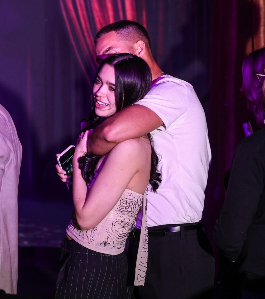 Ron Hall and Brooke Blewitt embracing at the Haus of Cabaret.