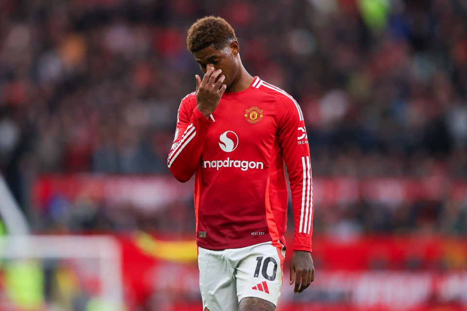 Marcus Rashford of Manchester United looking dejected during a soccer match.