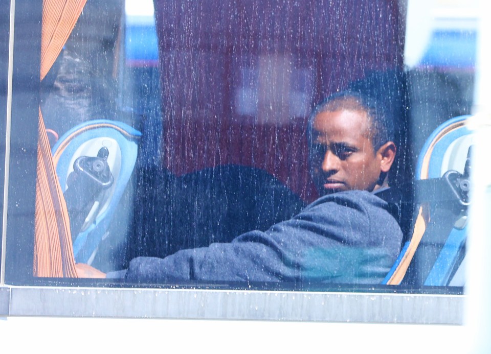 Migrants on a bus in Dover, UK.