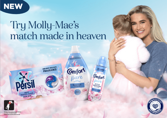 Molly-Mae with baby, holding Persil and Comfort Pure Heaven Scent products.